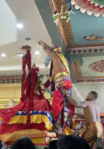 The priest conducts puja before the Vinayakar utsavamurti is taken on procession during the Chariot Festival 2021.