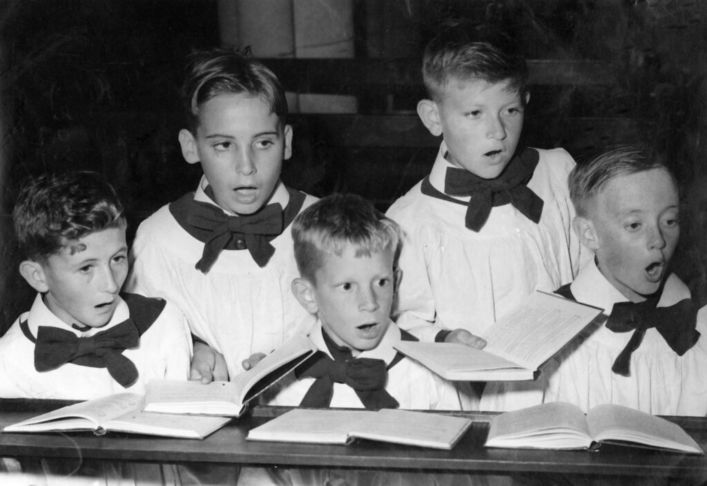 Figure 5: Choir boys practising at St John's Cathedral, Brisbane, 1958 (State Library of Queensland).